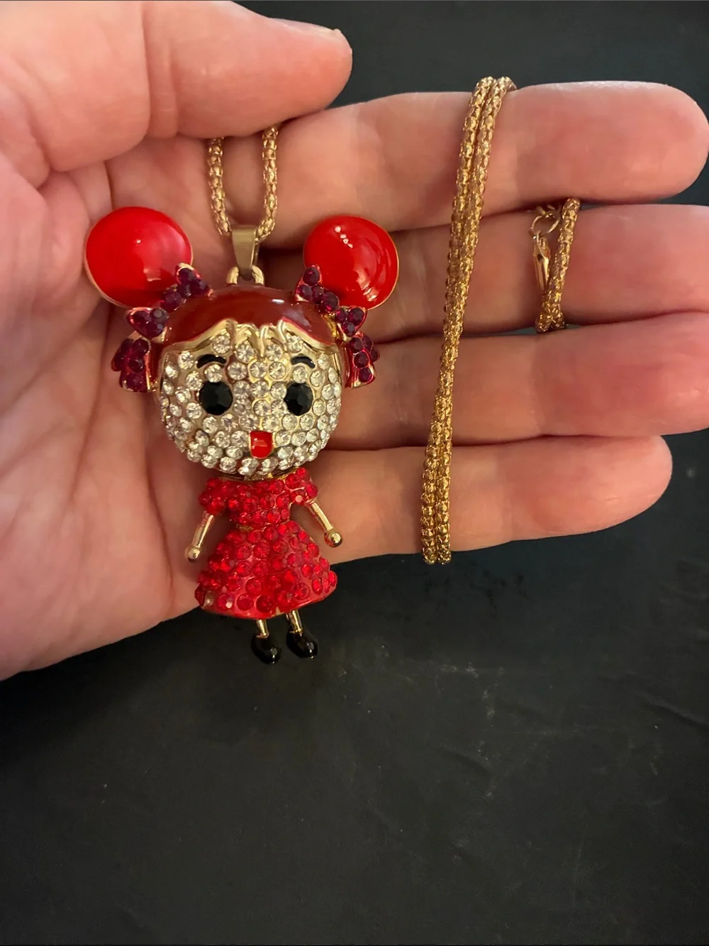 Doll Red Crystal Pendant. Her head turns, dress moves and feet move NWOT